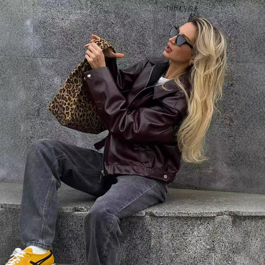 Veste en cuir unie à revers et fermeture éclair