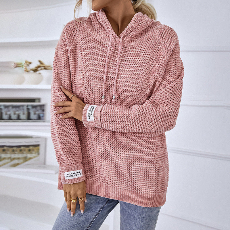 Pull tricoté de couleur unie
