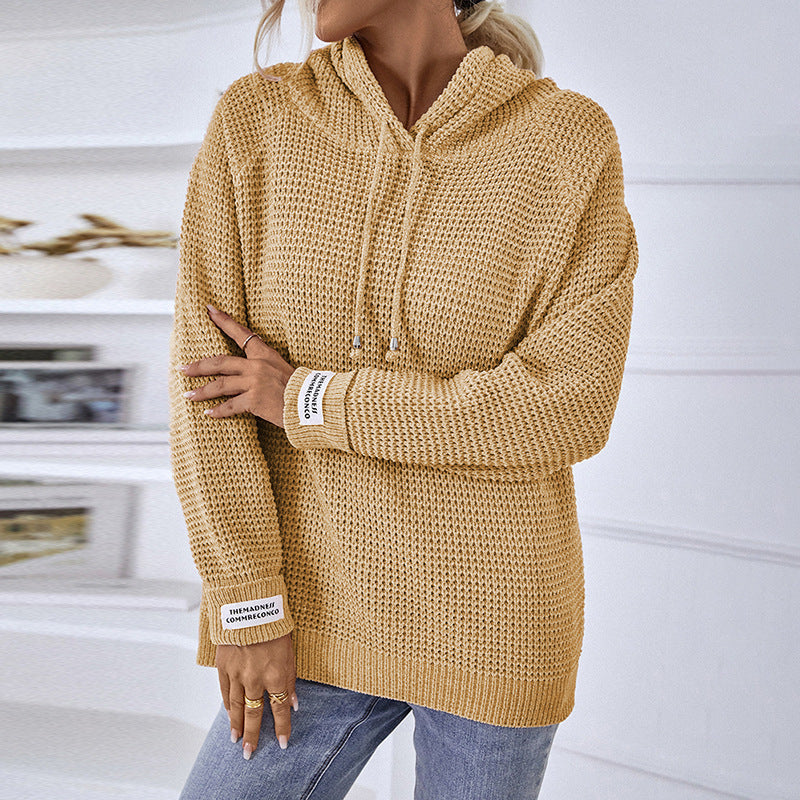 Pull tricoté de couleur unie