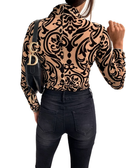 Pull à Col Rond Manches Longues.