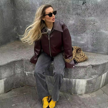 Veste en cuir unie à revers et fermeture éclair