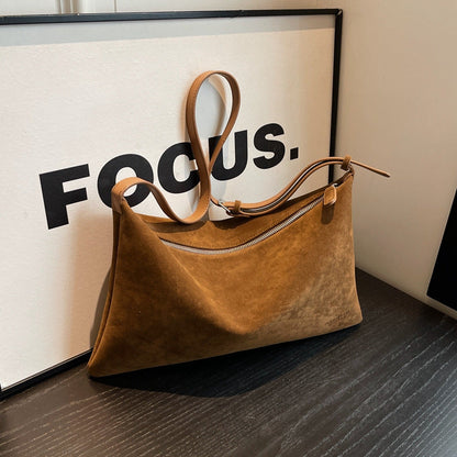 Sac de niche en daim.