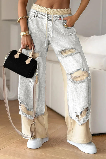 Pantalon en denim patchwork à taille élastique.