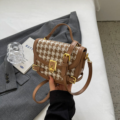 Sac à bandoulière à motif pied-de-poule.