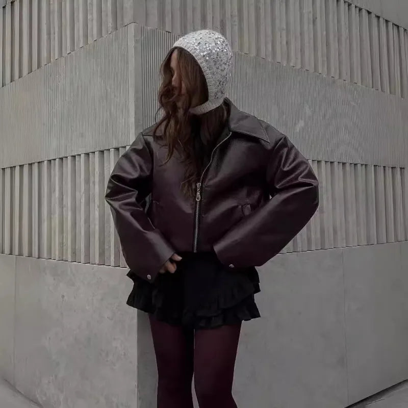 Veste en cuir unie à revers et fermeture éclair