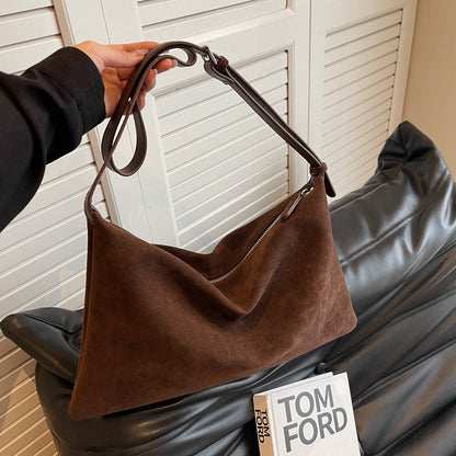 Sac de niche en daim.