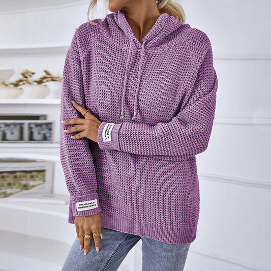 Pull tricoté de couleur unie