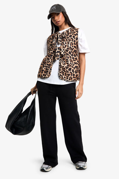 Gilet matelassé à détail noeud léopard.